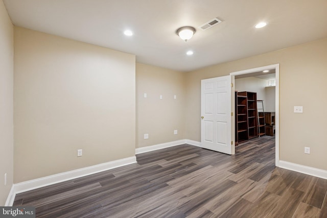 301 Gentle Breeze Cir, Fredericksburg, VA 22406 - empty room featuring dark wood-style flooring and recessed lighting