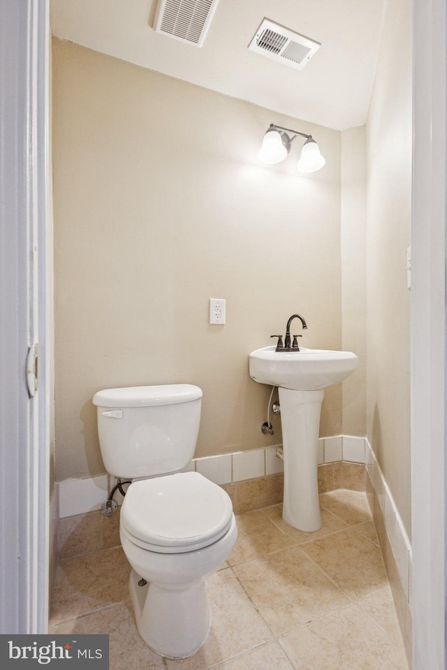 301 Gentle Breeze Cir, Fredericksburg, VA 22406 - bathroom featuring toilet and tile patterned flooring