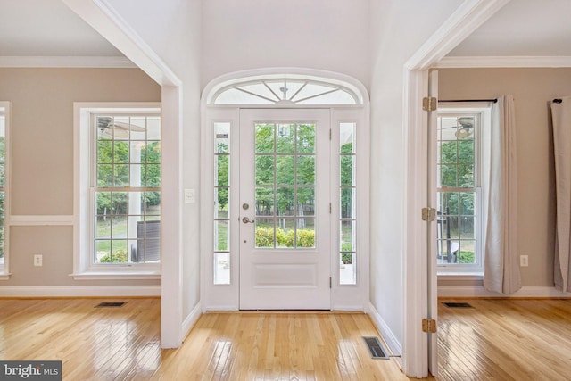 301 Gentle Breeze Cir, Fredericksburg, VA 22406 - entrance foyer featuring wood-type flooring and crown molding