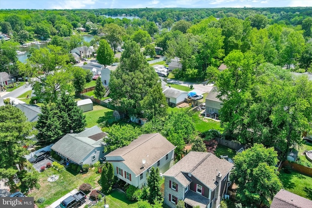 7707 W Dr, Glen Burnie, MD 21060 - aerial view of residential area with a nearby body of water and a forest
