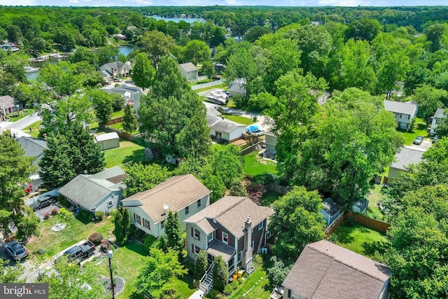 7707 W Dr, Glen Burnie, MD 21060 - aerial view of residential area with a nearby body of water and a heavily wooded area