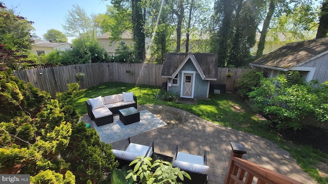 7707 W Dr, Glen Burnie, MD 21060 - fenced backyard with a patio area and outdoor lounge area