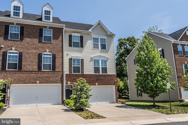 view of property with concrete driveway, brick siding, and a garage