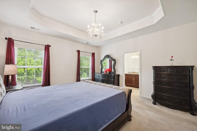bedroom featuring crown molding, a raised ceiling, a notable chandelier, and visible vents