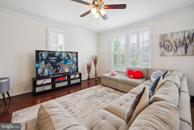 living area with crown molding, baseboards, a ceiling fan, and wood finished floors