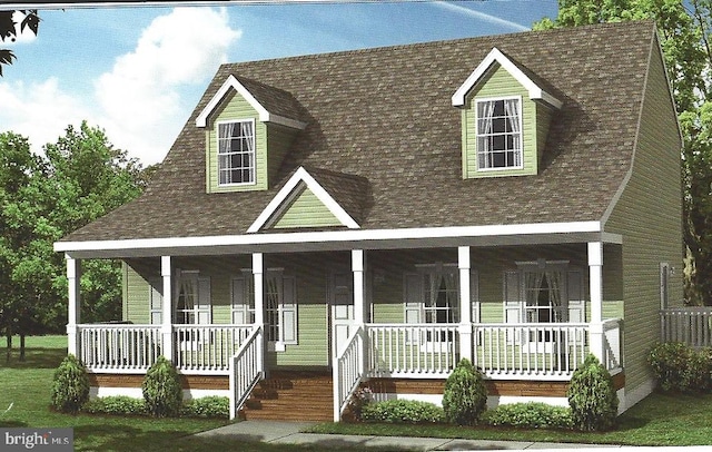 view of front facade featuring roof with shingles and a porch