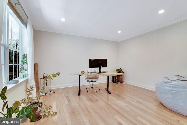 office area featuring recessed lighting, baseboards, ornamental molding, and light wood-type flooring