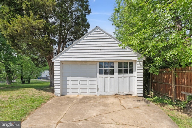 detached garage with fence