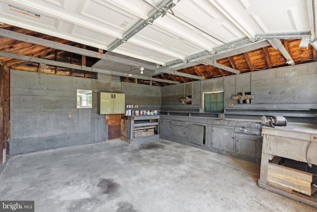garage with a workshop area