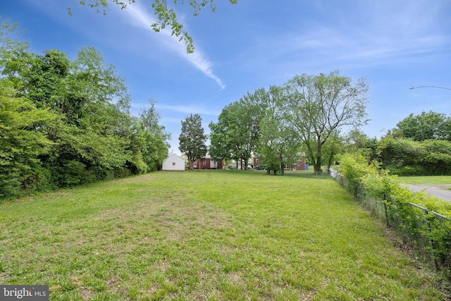 view of yard with fence