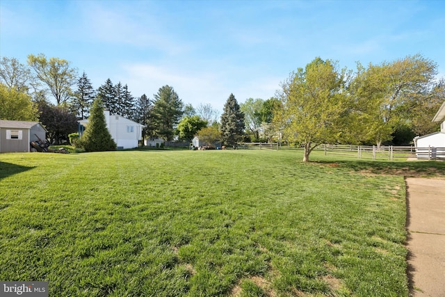 view of yard with fence