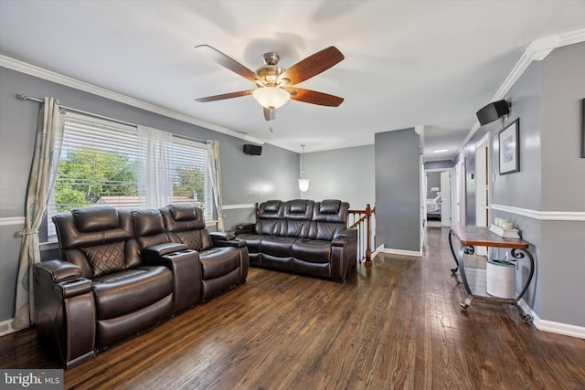 living room with crown molding, baseboards, ceiling fan, and dark wood-type flooring