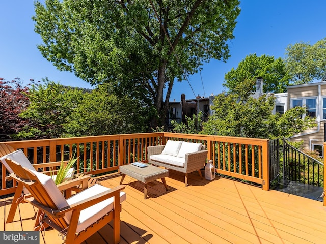 deck with outdoor lounge area