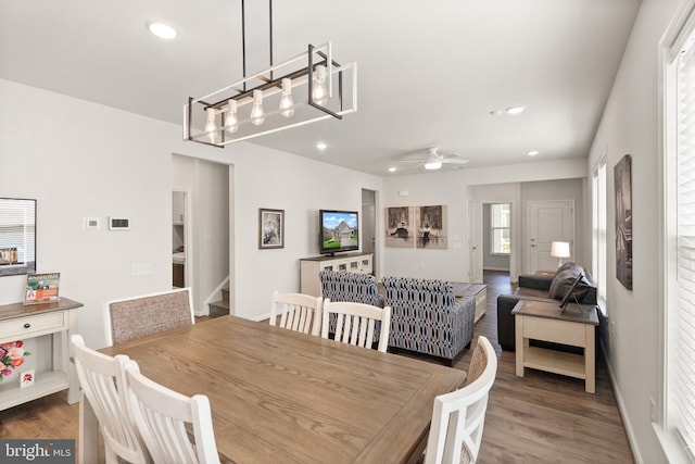 dining space with baseboards, recessed lighting, a ceiling fan, and wood finished floors