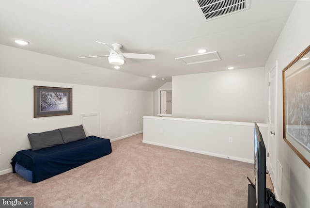 unfurnished room featuring carpet flooring, attic access, recessed lighting, lofted ceiling, and visible vents