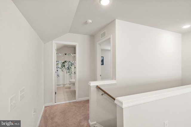 corridor featuring visible vents, light carpet, baseboards, recessed lighting, and an upstairs landing