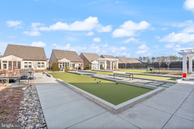 surrounding community featuring fence and a residential view