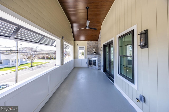 view of patio / terrace featuring ceiling fan and a balcony