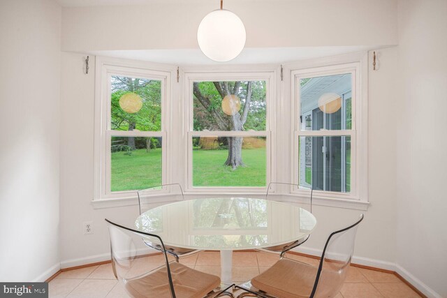 12405 Ellen Ct, Silver Spring, MD 20904 - dining space with light tile patterned floors and baseboards