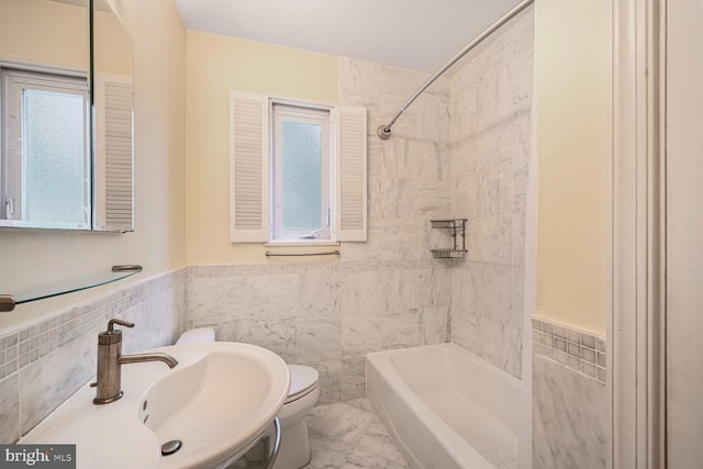 12405 Ellen Ct, Silver Spring, MD 20904 - full bath with toilet, a sink, shower / bath combination, tile walls, and wainscoting