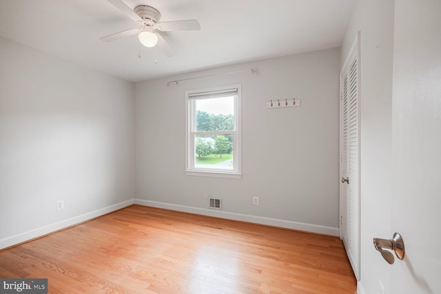 12405 Ellen Ct, Silver Spring, MD 20904 - spare room with light wood-style flooring, baseboards, and a ceiling fan