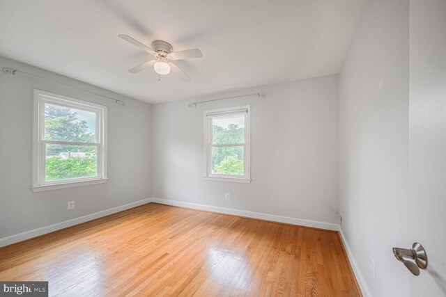 12405 Ellen Ct, Silver Spring, MD 20904 - empty room featuring baseboards, light wood finished floors, and a ceiling fan