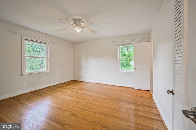 12405 Ellen Ct, Silver Spring, MD 20904 - unfurnished room featuring healthy amount of natural light, a ceiling fan, and light wood finished floors