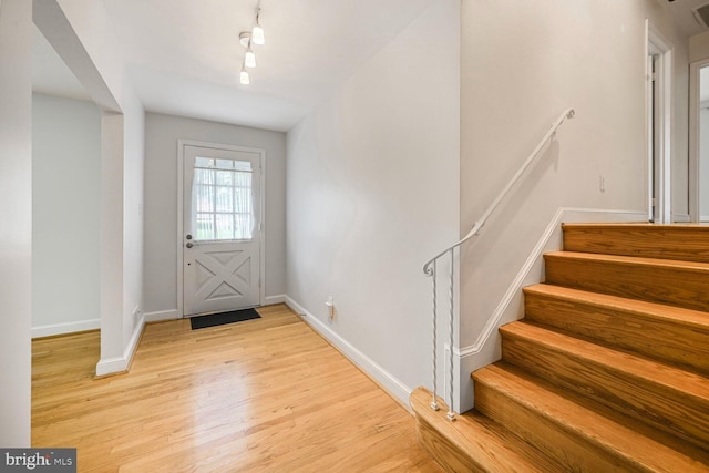 12405 Ellen Ct, Silver Spring, MD 20904 - foyer entrance with light wood-type flooring, baseboards, and stairs