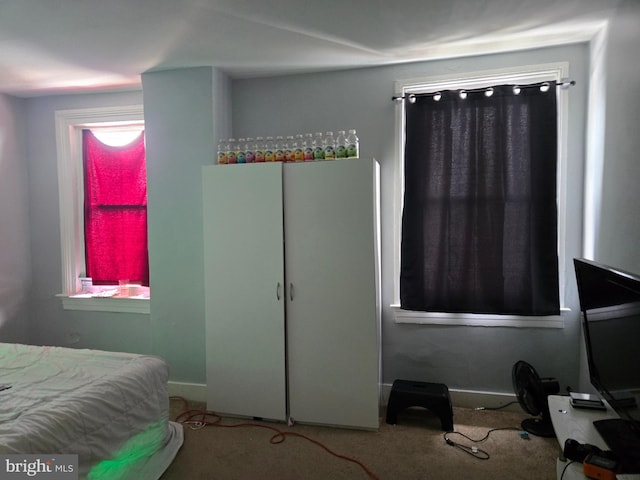 507 N Schroeder St, Baltimore, MD 21223 - carpeted bedroom featuring baseboards