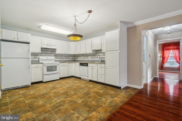 2013 Rudy Serra Dr Unit 2D, Eldersburg, MD 21784 - kitchen featuring white appliances, under cabinet range hood, a sink, white cabinets, and decorative backsplash