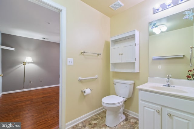 2013 Rudy Serra Dr Unit 2D, Eldersburg, MD 21784 - bathroom featuring toilet, baseboards, vanity, and wood finished floors