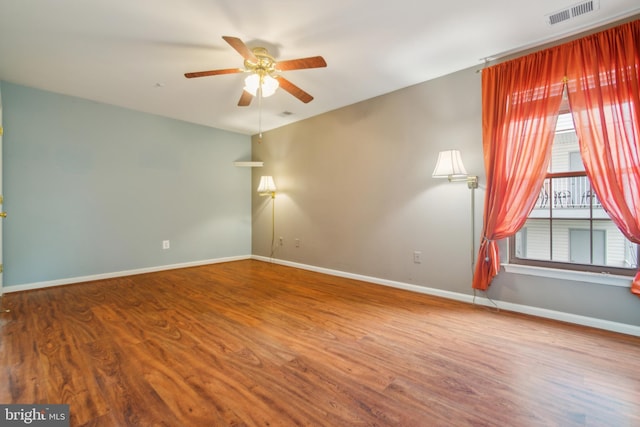 2013 Rudy Serra Dr Unit 2D, Eldersburg, MD 21784 - empty room featuring wood finished floors, ceiling fan, and baseboards