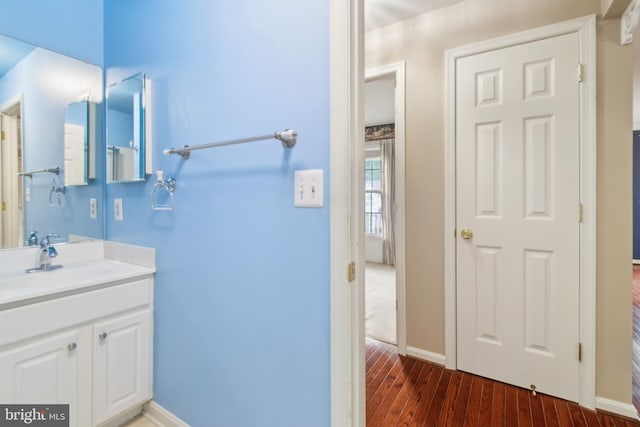 2013 Rudy Serra Dr Unit 2D, Eldersburg, MD 21784 - bathroom with wood finished floors, baseboards, and vanity