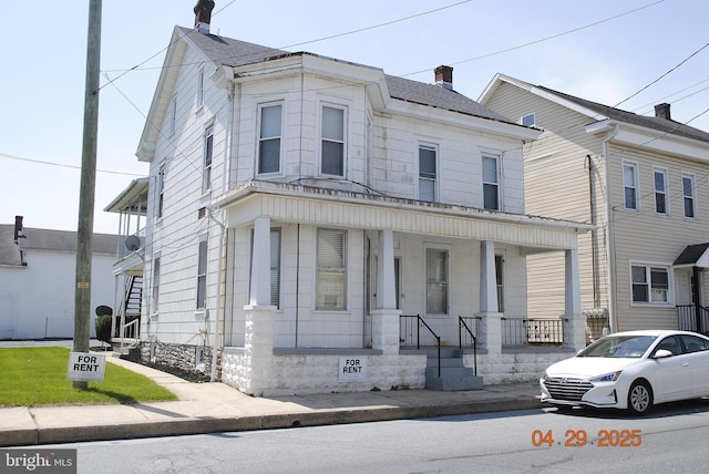110 E Main St, Richland, PA 17087 - view of front of house with a porch and a chimney