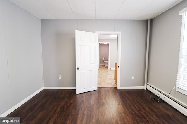 110 E Main St, Richland, PA 17087 - spare room with a baseboard heating unit, wood finished floors, and baseboards