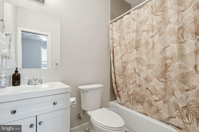 full bathroom with toilet, shower / tub combo, and vanity