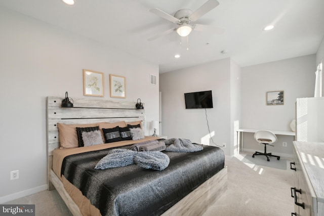 bedroom featuring recessed lighting, baseboards, and light carpet