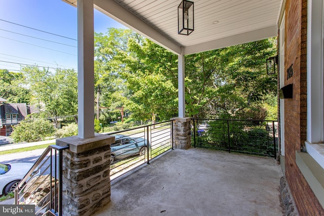 balcony featuring a porch