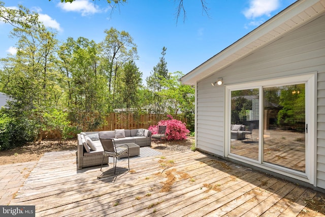 deck with fence and outdoor lounge area