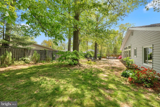 view of yard featuring a fenced backyard