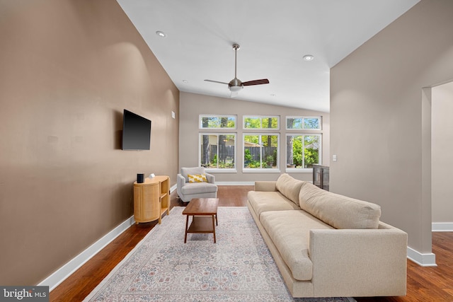 living room featuring a ceiling fan, baseboards, recessed lighting, dark wood-type flooring, and vaulted ceiling