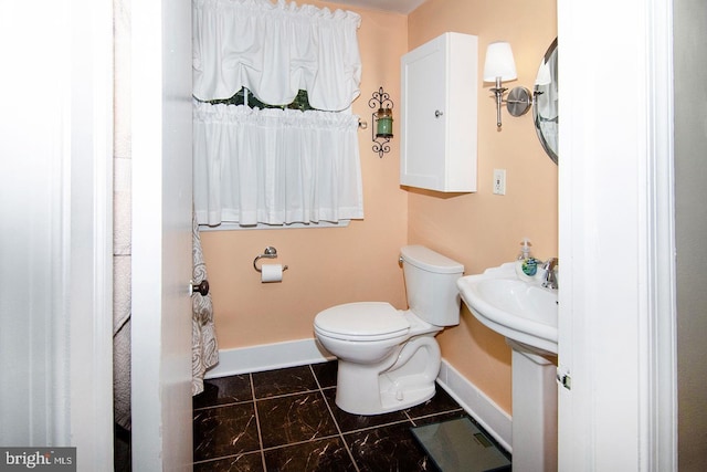 1108 W Mount Vernon Ave, Haddonfield, NJ 08033 - bathroom with baseboards, marble finish floor, and toilet