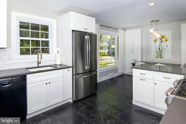 1108 W Mount Vernon Ave, Haddonfield, NJ 08033 - kitchen with dark countertops, a sink, dishwasher, freestanding refrigerator, and backsplash