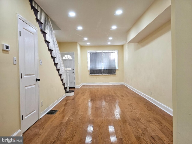 entrance foyer with visible vents, recessed lighting, baseboards, and stairway