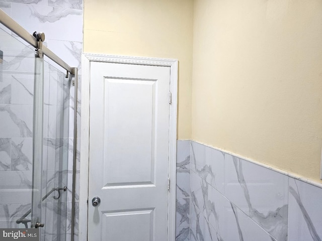 full bath featuring a stall shower