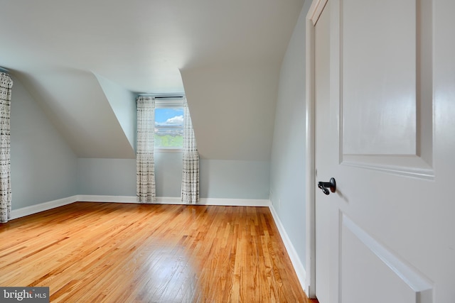 4255 Darleigh Rd, Baltimore, MD 21236 - additional living space featuring wood-type flooring, baseboards, and lofted ceiling