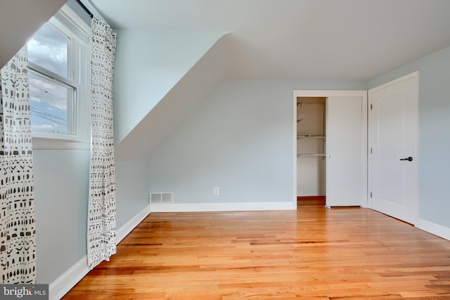 4255 Darleigh Rd, Baltimore, MD 21236 - additional living space featuring wood finished floors, lofted ceiling, and baseboards