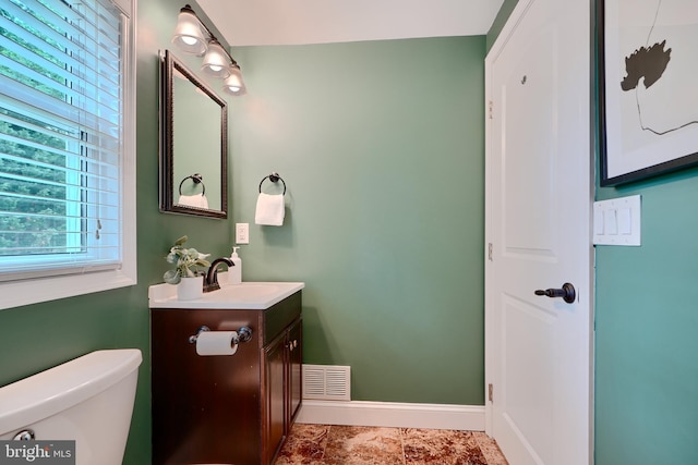 4255 Darleigh Rd, Baltimore, MD 21236 - bathroom featuring vanity, baseboards, and toilet