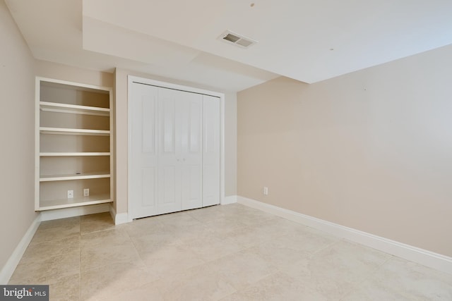 4255 Darleigh Rd, Baltimore, MD 21236 - unfurnished bedroom with baseboards, light tile patterned floors, and a closet