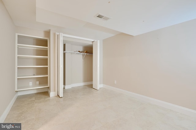 4255 Darleigh Rd, Baltimore, MD 21236 - unfurnished bedroom with baseboards, a closet, and light tile patterned flooring